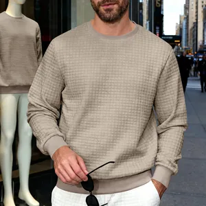Close-up view of men's casual crewneck sweatshirt with unique waffle grid texture