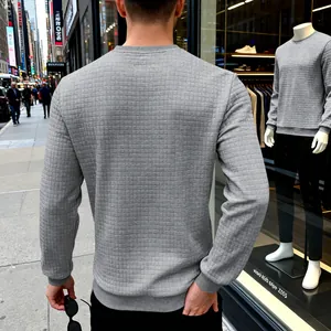 Rear view showing the unique square grid texture of this grey men's sweatshirt.