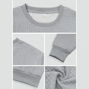 Close-up details of men's gray sweatshirt with square texture collar and cuffs