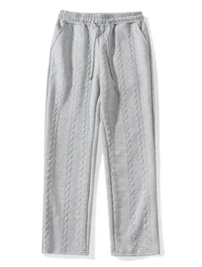 Detail of light gray men's leisure pants featuring a unique cable knit texture
