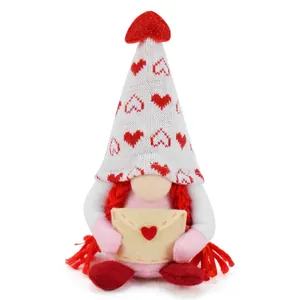 Valentine's Day gnome plush doll featuring a knitted heart hat and a felt envelope detail