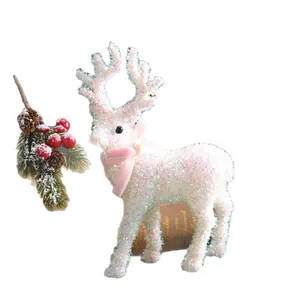 Funkelnde weiße Glitzer-Weihnachtsrentier-Figur mit rosa Samtschleifen-Dekor.