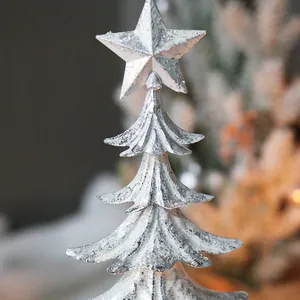 Elegant silver Nordic style Christmas tree candle holder for holiday table decoration.