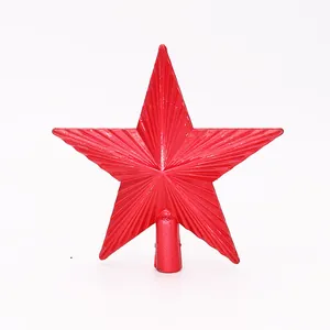 Detailed view of a vibrant red five-pointed Christmas tree topper star ornament.