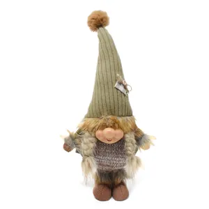 Detailed macro view of a Nordic forest gnome doll featuring a green hat and braids