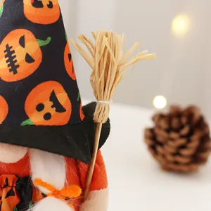 Halloween gnome witch doll with pumpkin print hat and miniature straw broom decor
