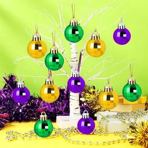 Decorative 3cm mirror balls in green, gold, and purple hanging on a white branch