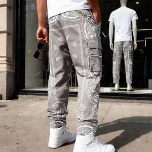 Back view detail of men's grey paisley cargo pants with streetwear hip-hop style