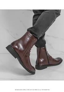 Gros plan de bottines Chelsea pour hommes en cuir marron avec fermeture éclair latérale