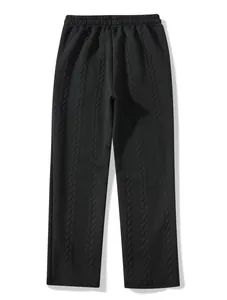 Full view of men's black jacquard knit trousers with elastic waist and braided texture.