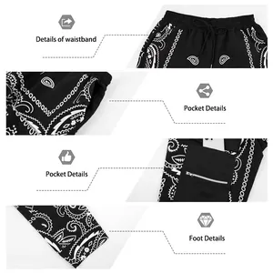 Close-up detail of black bandana print hip-hop pants showing waistband, pockets, and cuffs.