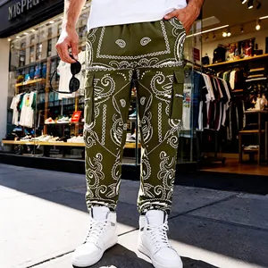 Men's olive green cargo pants with white paisley pattern and high-street hip-hop style