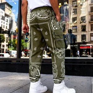 Olive green paisley print cargo pants for men in high-street hip-hop streetwear style