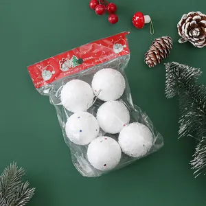Set of 6 sparkling white foam snowball Christmas ornaments in festive retail packaging