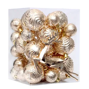 Elegante set di decorazioni natalizie color champagne con renna e palline testurizzate