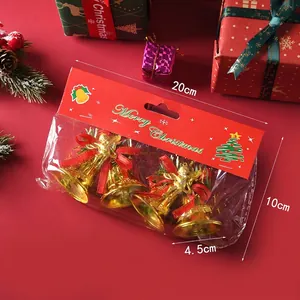 Packaged gold Christmas bells with dimensions and 28g weight info for tree decor.