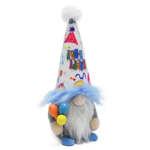 Close-up detail of plush birthday gnome with Happy B-Day hat and colorful balloon elements