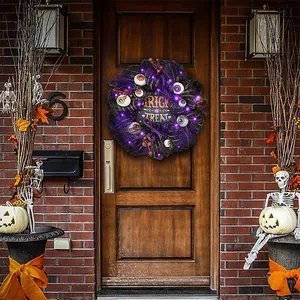 Spooky Halloween eyeball wreath with purple mesh and LED lights for front door decor