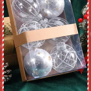 Detailed view of six decorative Christmas ornament balls in a windowed kraft gift box