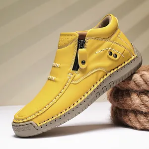 Vibrant yellow high-top casual leather shoe with slip-on design for outdoor comfort.
