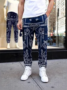 Men's blue paisley cargo pants with loose hip-hop street style design on city street