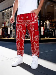 Men's red paisley print cargo pants featuring a high street hip hop relaxed fit