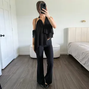 Sexy black halter neck backless camisole with irregular draped hem and metal ring detail
