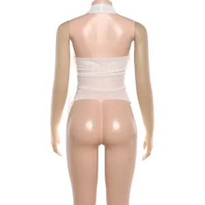 Back view of white halter neck backless tank top with irregular hem