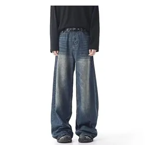 Men's loose wide-leg jeans featuring vintage yellow mud wash and straight fit detail