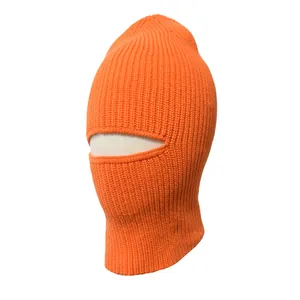 Detailed view of vibrant orange knit balaclava for winter warmth and wind protection.