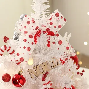 Mini white Christmas tree decoration with red baubles and wooden Noel sign ornament