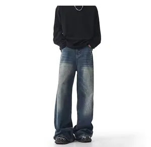 High-quality men's wide-leg denim jeans featuring a unique vintage yellow mud wash effect