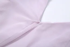 Macro detail view of light purple mesh fabric showing fine texture and seam quality.