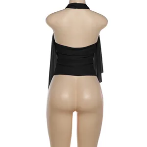 Back view detail of a sexy black halter neck camisole with irregular draping hemline