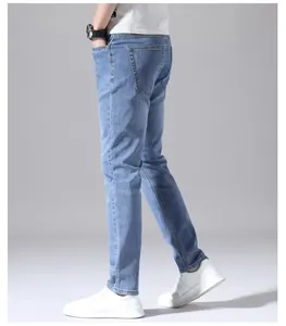 Side view of slim fit light blue denim jeans for men with summer weight fabric