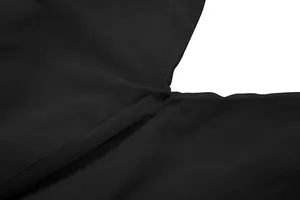 Close-up of fine breathable black mesh fabric texture on a sexy halter camisole top