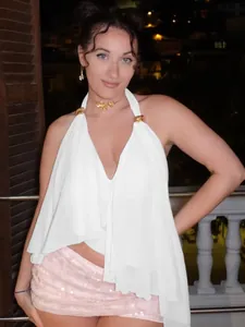 Fashionable sexy white halter neck backless V-neck top with irregular hem for women