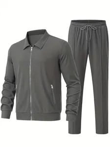 Detailansicht des dunkelgrauen Waffelstrick-Trainingsanzugs für Herren mit Jacke.