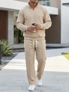 Casual men's beige waffle knit sweatshirt and matching pants set with half-zip collar