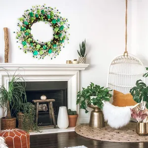 St. Patrick's Day wreath with green shamrocks and berries for home wall decor