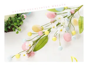 Detailed view of artificial Easter branch with colorful pastel eggs and flowers
