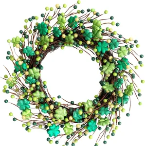 St. Patrick's Day shamrock wreath with green and gold berries for holiday decor
