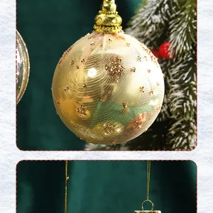 Macro detail of golden mesh Christmas tree ball ornament with glitter flower pattern