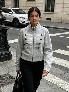 Elegant grey military-style zip-up jacket for women in a chic urban street photography setting