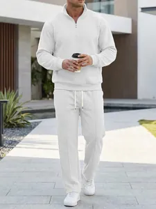 Men's white waffle knit tracksuit set with half-zip sweatshirt and matching joggers