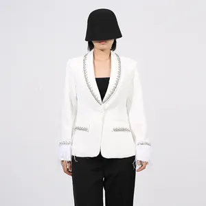 Elegant white French style blazer featuring feather cuffs and crystal detailing.