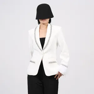 Elegant white blazer with crystal trim and ostrich feather cuffs in French style.