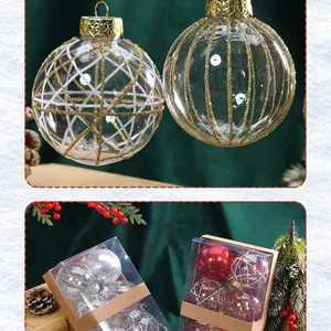 Close-up and boxed view of clear Christmas ornaments with elegant gold glitter patterns