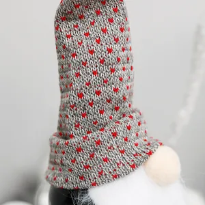 Christmas gnome wine bottle cover with grey knitted heart pattern hat and white beard