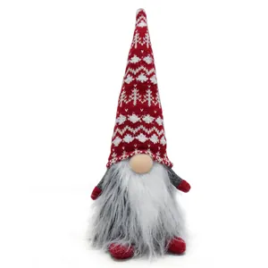 Handmade Christmas gnome plush with a red knitted hat and long grey beard detail